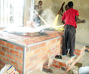 Cooks at Mayange Primary School: The improved stove provides cleaner air for everyone.