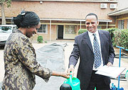 The Minister of Agriculture, Dr Agnes Kalibata receiving part of the equipment from WFP Country Director Abdoulaye Balde yesterday. ( Courtesy photo)
