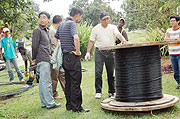 Chinese Technicians lay the fibre optic cable in Rwanda.(File Photo)