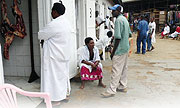 WAITING: Women in the butchery business patiently wait for clients in Kimironko market. (Photo / F. Ndoli)