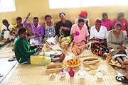 Women weaving the precious AGASEKE. (Photo S Rwembeho)