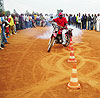 A man attempts one of the tests for motocycles. (Photo S Rwembeho)