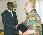 Prime Minster Bernard Makuza bidding farewell to Belgian Chief of Defence Gen Charles-Henri Delcour after their meeting. (Photo; F. Goodman)