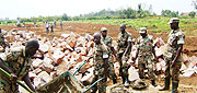 RDF soldiers of the 405 Battalion laying a classroom foundation. (Photo / S Rwembeho)
