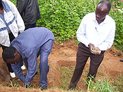 Mayor Justus Kangwagye (Right) participating in tree planting campaign at Yanze watershed recently. (Photo A Gahene)
