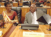 Newly sworn-in Senators, Umulisa Henriette (L) and Jose Kagabo