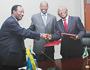 (L-R) State u2003Minister for energy  Dr. Albert Butare, Finance minister James Musoni, Diko Mukete ADB Resident Representative. (Photo F goodman)