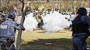 South African Riot Police quelling soldiers protests with tear gas