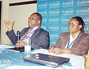 Clement Dodo,(R)  the Executive Director of Ecobank, the Pan African Bank in Rwanda, and Muhanga Branch manager, Solange Ingabire. Photo / D. Sabiiti)