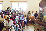 Lt Desire Sezikeye talks to Muganza residents. (Photo /  J.P. Bucyensenge)