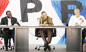President Paul Kagame at the RPF Political Bureau meeting yesterday. Left is the partyu2019s vice chairman Christophe Bazivamo while on the right is the Secretary General, Franu00e7ois Ngarambe.