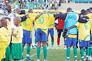 Amavubi players gather for a word of prayer before their goalless draw in the first leg against Algeria. The team enters camp next Tuesday ahead the return leg on October 10.