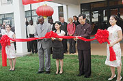 Minister Joseph Habineza and Ambassador Sun Shuzhong cutting the ribbon at the event yesterday. (Photo: F. Goodman)