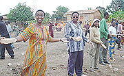 Senator Aloysia Inyumba joins residents in constructing three classroom blocks at GS Munyinya, Nyamabuye sector 