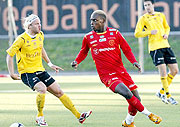 Bobo Bola tries to get past a BK player in the Superettan league.