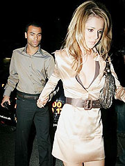 She will do anything to impress her man, however much he cheats or hates her.