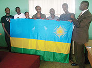 Sports Minister Joseph Habineza (R) urging national team representatives to go and win medals in Lebanon yesterday at Amahoro stadium. (Photo /B. Mugabe)