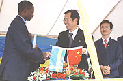 Chinese Ambassador handing over the school keys to state Minister for Primary and Secondary Education, Dr. Mathius Harebamungu.