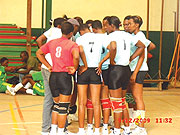 Rwanda Revenue Authority players laying strategy ahead of the semifinal game against the National University of Rwanda.