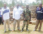 Local leaders and security officials at  a construction site in Karembo sector. (Photo: S. Rwembeho)
