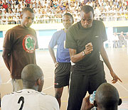  Jean Luc Ndayikengurukiye gives a few tips to his players during this yearu2019s Genocide Memorial tournament. The former APR captain has been suspended from his coaching duties. (File photo)