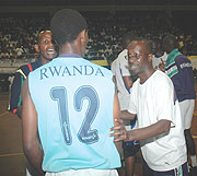 Jean Marie Nsengiyumva (R) talks to one of his players during Sundayu2019s Coupe du Rwanda final against APR. KVC won the contest 3-1. (Photo/ F. Goodman)