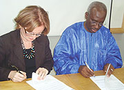 British High Commissioner to Tanzania, Diane Corner and ICTR Prosecutor Hassan Bubucar Jallow signing the agreement. (Photo/ G. Muramila)