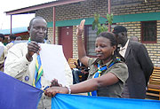 Jean Paul Mushaija (left), the ASR legal representative administers  an oath of office to one of the  newly elected national advisory council members of the ASR. (Photo/ D. Sabiiti)