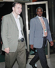 ON ARRIVAL: Polandu2019s Foreign Minister Radoslaw Sikorski and Education Minister Charles Murigande on the formeru2019s arrival at Kigali international Airport on Sunday. (Photo/ J. Mbanda)