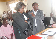 Theonetse Mutsindashyaka (R) and his lawyer Beatrice Umubyeyi explaining himself to the court Judge yesterday. (Photo/ E.Mutara)