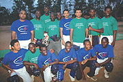 The national cricket team poses for a group photo shortly after their final practice session on Wednesday. The team is expected to arrive in Madagascar this morning. (Photo/ J. Mbanda)