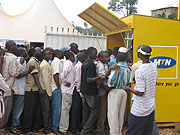 Revellers scramble for MTN products. (File Photo)