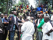 Mayor Celestin Kalabayinga sorrounded by residents on Tuesday as land sharing exercise caused commotion in Gataraga sector. (Photo/ B. Mukombo)