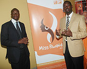 Culture and Sports Minister Joseph Habineza (L) and Rwandatel CEO Patrick Kariningufu unveil the Miss Rwanda Logo yesterday. (Photo/ J. Mbanda)