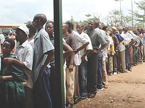 BIG TURN UP:  Residents of Rukiri 2 in Remera line behind their favourite female representative at Rukara 2 polling station yesterday morning.(Photo/ F. Goodman)