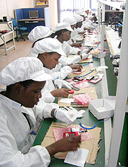 Workers at the A-Link mobile phone assembly plant in Kigali Rwanda(File photo)