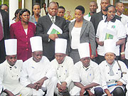 Chefs from different hotels pose for a group photo with the organisers of the hospitality industry training. (Photo: B. Mukombozi)