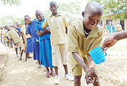 Pupils of Rwesero Primary School washing hands before being dewormed yesterday (Courtesy Photo)