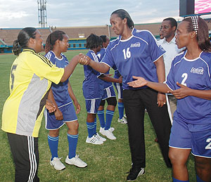 First Lady Jeannette Kagame greeting members of Nyampinga FC, the Rwandan team, yesterday. (Photo/ J Mbanda)