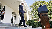 President Obama arrives in the Rose Garden of the White House in to speak about winning the 2009 Nobel Peace Prize.