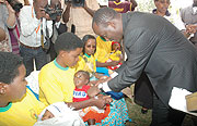 Health Minister Dr. Richard Sezibera taking part in the Immunisation exercise in Gashora early last week.