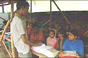 16-year-old Babar Ali in his makeshift school.