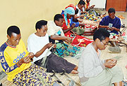 A cross section of women in Kigali City weaving baskets for export (File Photo)