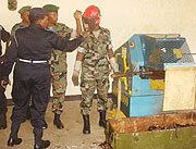 The acting Commissioner General of Rwanda National Police Mary Gahonzire inspecting the cutting and crushing machine.
