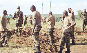 RDF forces engage in a cleaning exercise upon their arrival in Kitgum, Northern Uganda    (Courtesy Photo)