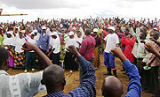 RPF supporters dance in excitement during the meeting. (Photo S Rwembeho)