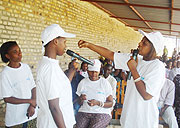 RTSA women presenting a role play centered on GBV within their community.(Photo D.Sabiiti)