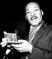 Martin Luther King Jr with the Nobel Peace Prize. The Nobel Commitee chose President Obama as this yearu2019s recipient, causing a global debate.