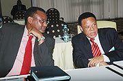 AT THE CENTRE:  EAC Secretary General Juma Mwapachu (R) with EALA Speaker Abdirahin Haithar Abdi during a meeting in Kigali early this year.