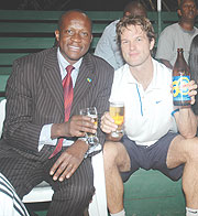 (L-R) The Minister of Sports and Culture Joseph Habineza and the Bralirwau2019s Managing Director Sven Piederiet toss to the u2018Guma Guma Tournament.